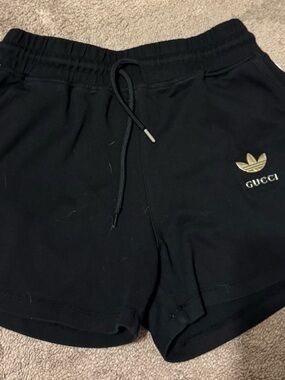 Gucci Black Athletic Logo Shorts with Gold Emblem
